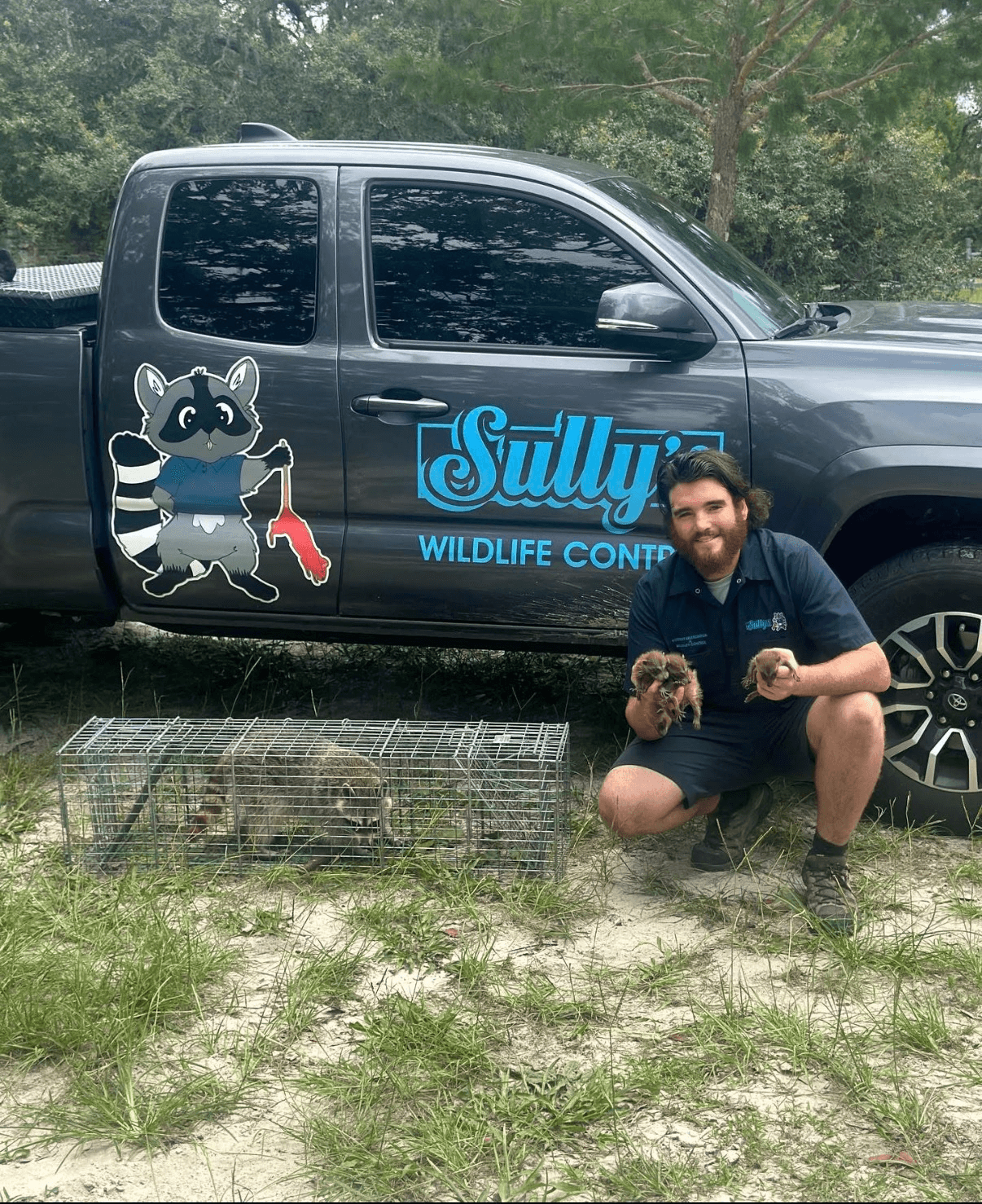 Sullivan McKee with Sully's Wildlife Control truck